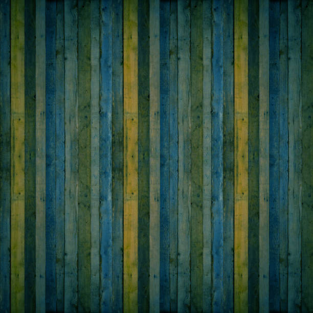 istock Old rustic dark grunge yellow blue colored painted wooden timber table wall floor flooring texture - wood background square blank pattern design 1404680217
