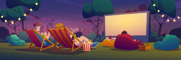 Night open air cinema on lawn in city park Night open air cinema on lawn in city park, garden or backyard. Vector cartoon summer landscape with empty outdoor movie theater with big screen, chaises, picnic baskets and lightbulb garland movie-theater-exterior stock illustrations