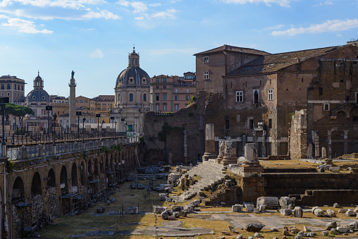 Rome, Italy - June 18, 2022:\nthe Trajan's Markets near Via dei Fori Imperiali, the great road that connects Piazza Venezia to the Colosseum