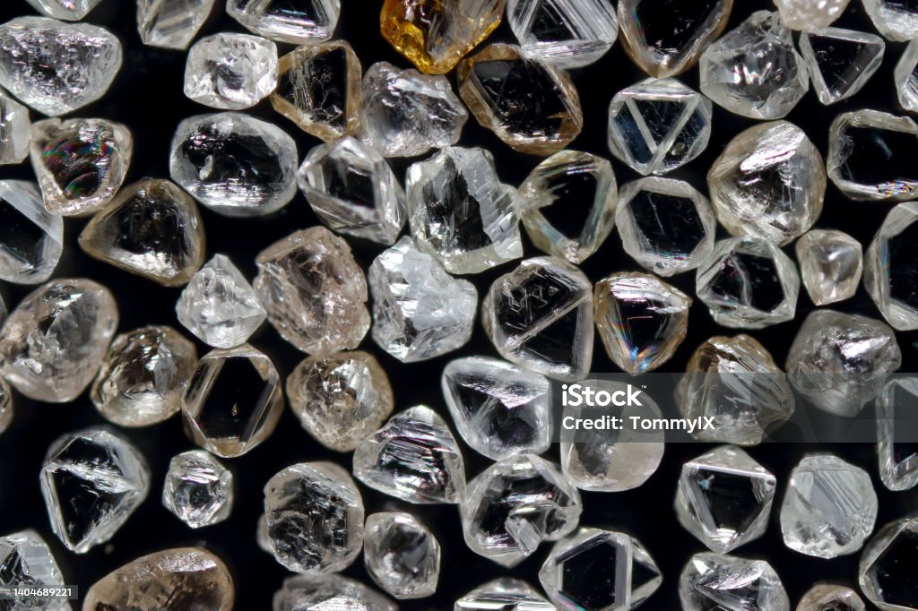 Natural rough fancy diamond crystal Closeup natural rough crystal of fancy diamonds Diamond - Gemstone Stock Photo