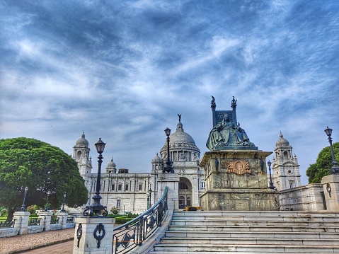 The Victoria Memorial is an iconic structure in Kolkata. This white marbled opulent structure established in 1921,  and was built in memory of Queen Victoria to celebrate her 25 years of rule over India and is almost a replica of the Victoria Memorial in London.