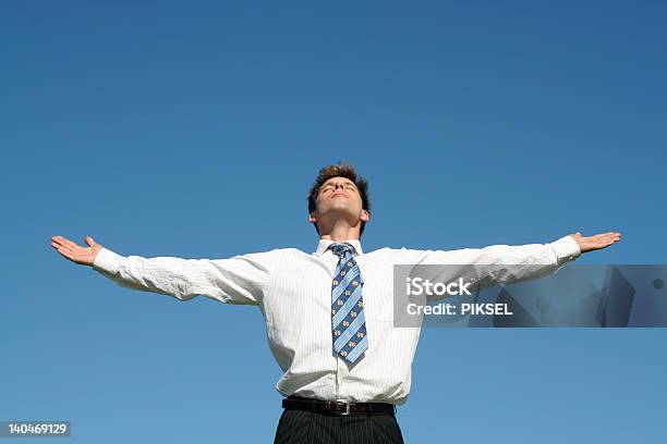 Businessman With Arms Outstretched Stock Photo - Download Image Now - Arms Outstretched, Businessman, Stretching