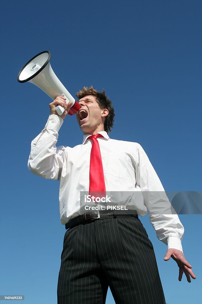 Empresário gritando através de megafone - Foto de stock de Adulto royalty-free