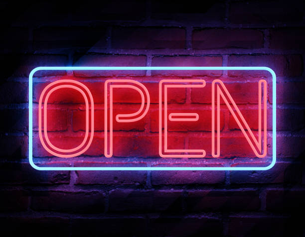 istock Neon open sign on brick wall background. Bright blue red lamp electric illuminated decoration, 3D illustration 1404694064