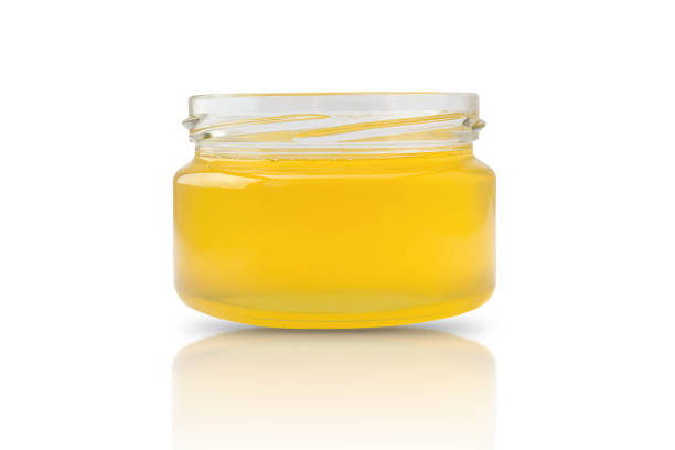 istock a small jar filled with fresh honey 1404694142