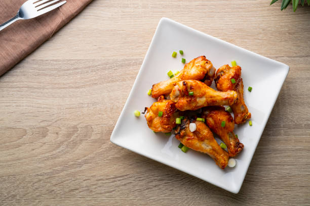 Air Fryer drummet chicken with Fish Sauce Air Fryer drummet chicken with Fish Sauce on white plate.Top view CHICKEN LEG stock pictures, royalty-free photos & images