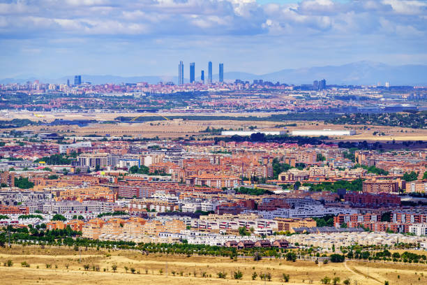 Aerial view of the city of Madrid and its metropolitan area from a nearby mountain. Aerial view of the city of Madrid and its metropolitan area from a nearby mountain alcala de henares stock pictures, royalty-free photos & images