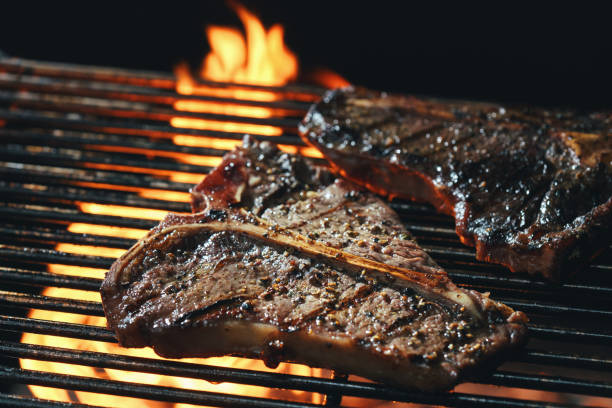 istock Roasting  T-Bone Steak on BBQ Grill 1404697619
