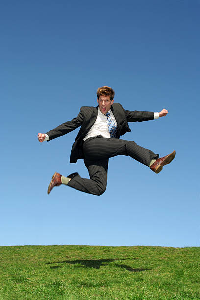 istock Businessman Leaping for Joy Outdoors 140469962