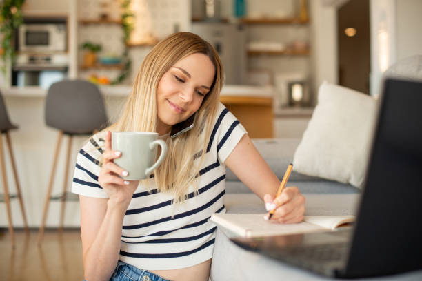 istock Young woman working from home 1404701613