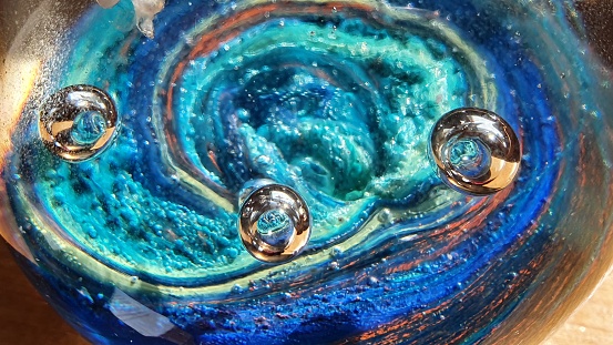 Bubbles and colours in glass abstract