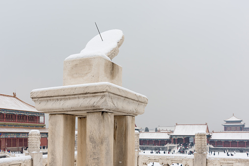 Beijing Forbidden City sundial in the snow