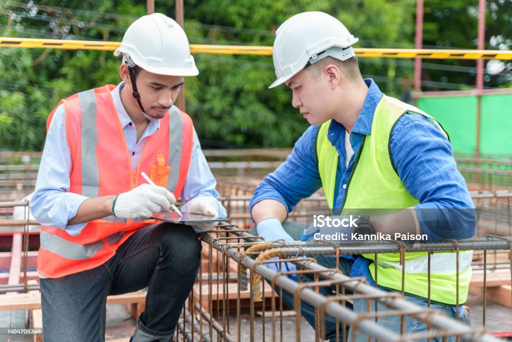 Constructer Working Teamwork Of Asian Constructor Engineer Working On Construction Site ...