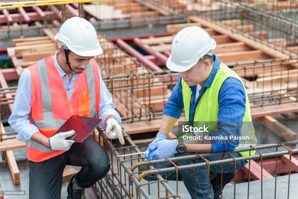 Constructer Working Teamwork Of Asian Constructor Engineer Working On Construction Site ...