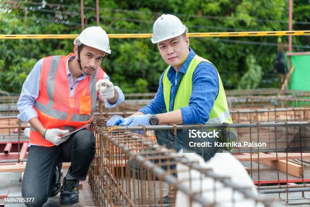 Constructer Working Teamwork Of Asian Constructor Engineer Working On Construction Site ...