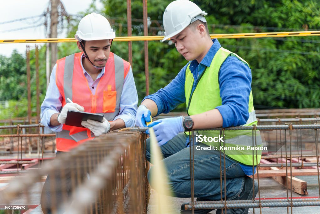 Constructer Working Teamwork Of Asian Constructor Engineer Working On Construction Site ...