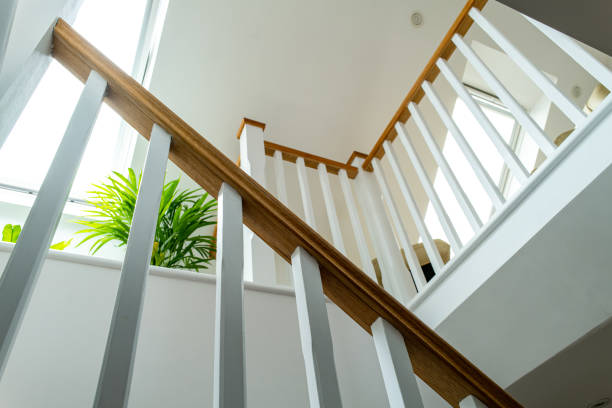 Shallow focus of wooden bannister seen on a loft conversion. stock photo
