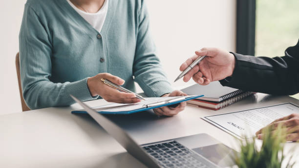 istock Businessman collaboration agreement resume employment contract documents at the office. 1404707053