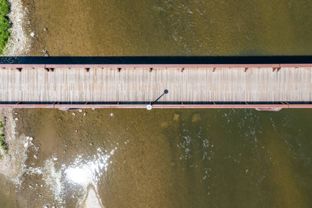 aerial the plywood patch bridge at grand river, brantford, canada - ontario spring bicycle city life imagens e fotografias de stock