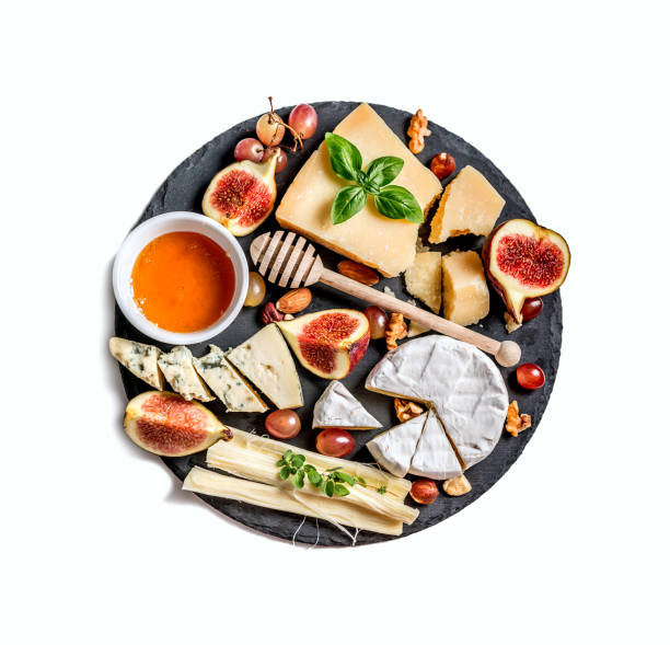 piatto di formaggi servito con noci e miele - cheese platter foto e immagini stock
