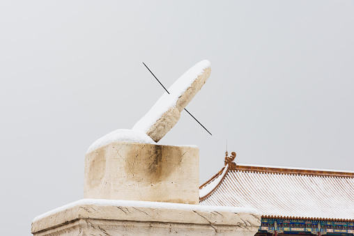 Beijing Forbidden City sundial in the snow