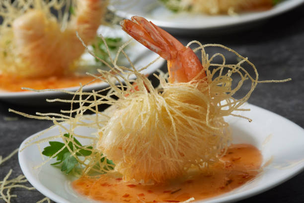 Deep Fried Prawns Wrapped with Rice Noodles and Deep Fried and Served with a Sweet Chili Sauce