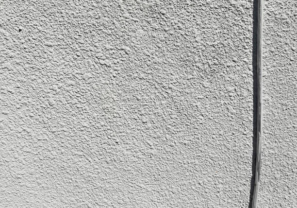 istock Close up of cracked,weathered wall background 1404714612