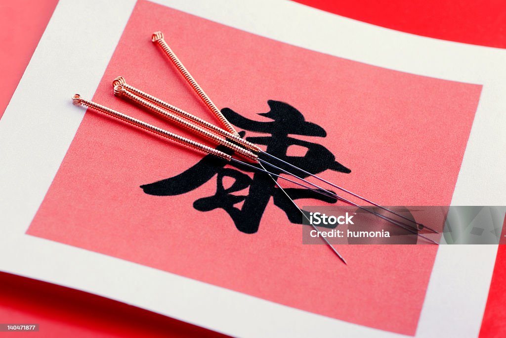 Acupuncture And Health Needles for acupuncturist shown on Chinese Health sign. Acupuncture Stock Photo