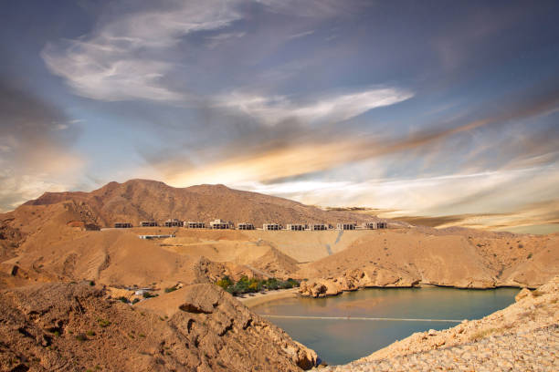 muscat coast sea view, hotel houses mountain landscape, oman - oman beach nature stone imagens e fotografias de stock