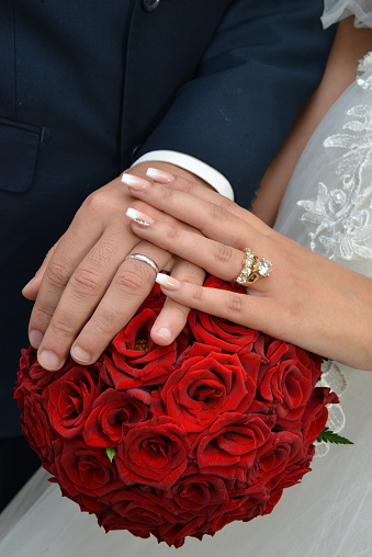 Close up of moroccon couple's hands at a wedding, concept of marriage, moroccan wedding