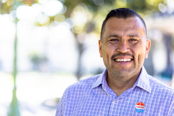 Mexican Man with I voted Sticker stock photo