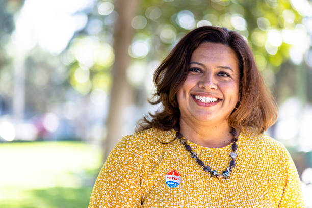 istock Mexican Woman with I voted Sticker 1404722085