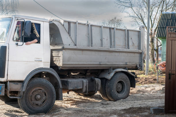 istock Trucks loaded with construction materials- fine grain sand, Transporting building 1404723679