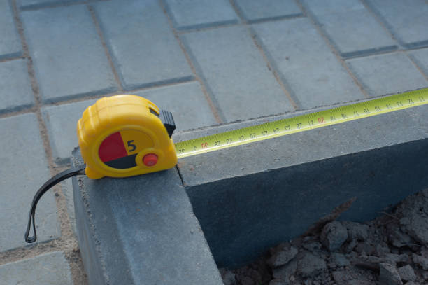 istock Measuring tape scale yellow roll construction tool inch centimeters size 1404725303