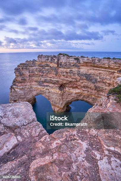 Sunrise At Praia Da Marinhas Heart Shaped Rocky Cliffs Along The Famous Algarve Coast In Southern Portugal Europe Stock Photo - Download Image Now