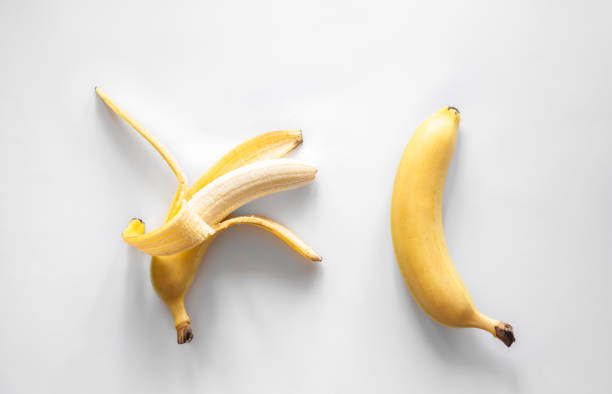 istock Two bananas on a white background isolated, conceptual minimalism. 1404726084
