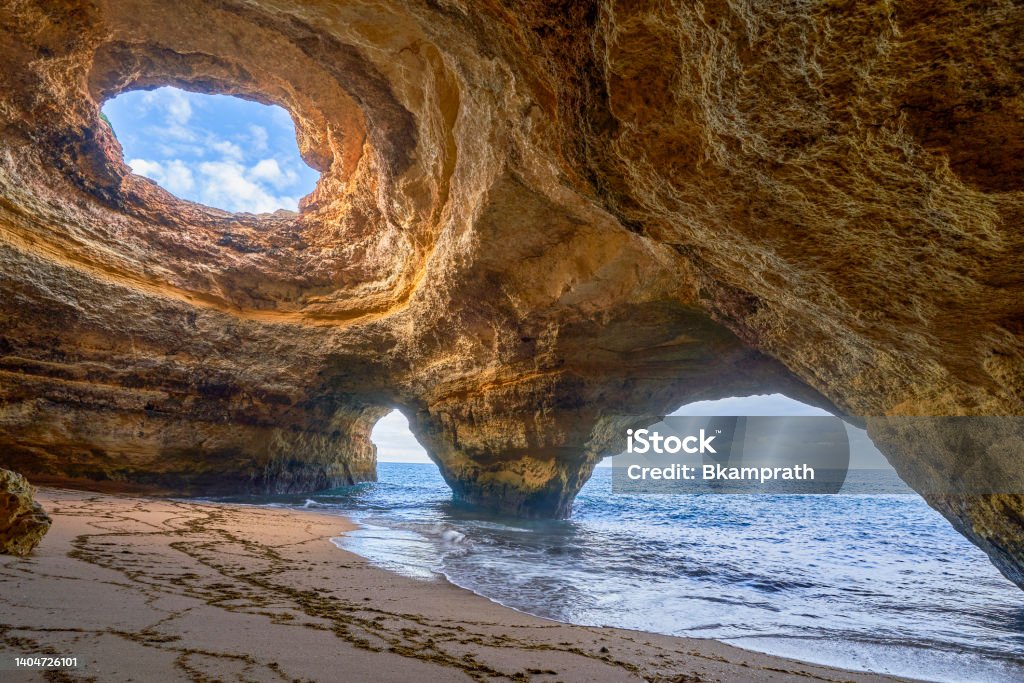 Beautiful Sea Cave Known as Grotte de Benagil "Benagil Grotto" on the Famous Algarve Coast in Southern Portugal, Europe Beautiful sea cave known as Grotte de Benagil "Benagil Grotto" on the famous Algarve Coast in Southern Portugal, Europe. Mediterranean Sea Stock Photo