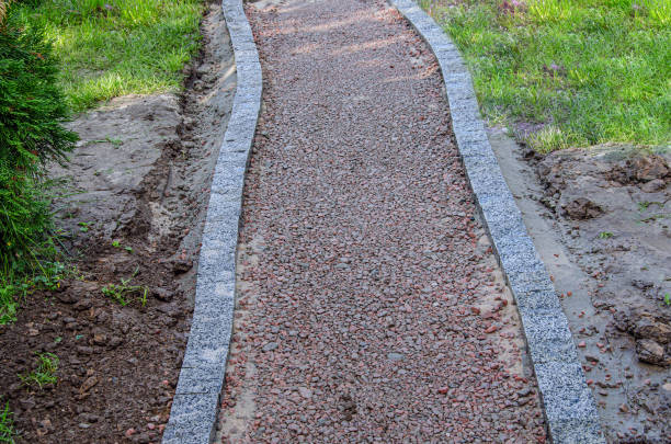 istock lonely, gravel macadam footpath with grass on either side 1404730238