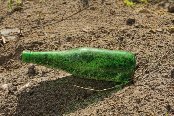 istock garbage from one dirty glass green bottle 1404731785