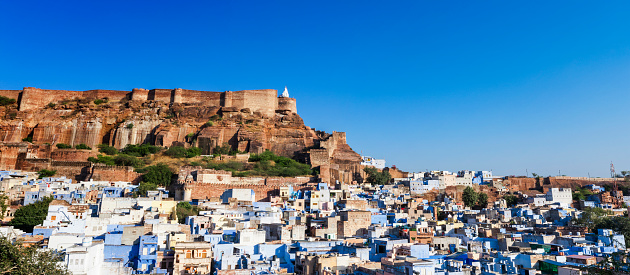 High angle panoramic cityscape of “The Blue City” Jodhpur, Rajasthan, India. Multiple files stitched.