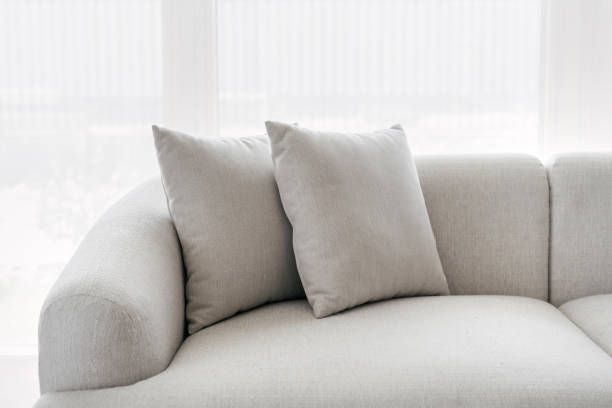 istock Cushions and sofa in modern living room 1404735351