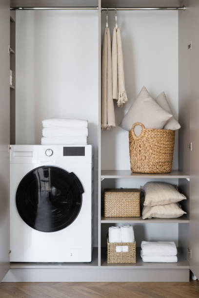 istock Bathroom accessories and washing machine in modern room 1404735698