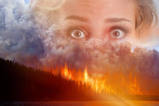 Multiple exposure of young woman and wildfire Multiple exposure of young woman and wildfire boundary waters canoe area stock pictures, royalty-free photos & images