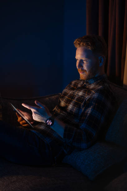 istock A Happy Ginger Influencer Enjoying Watching His Favourite Podcast On His Tablet While Relaxing At Home 1404741191