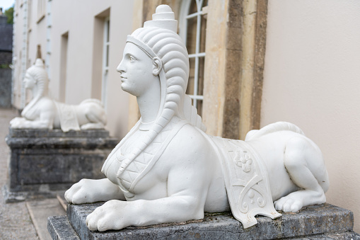 Plymouth.Devon.United Kingdom.August 6th 2021.A pair of statues of sphinxes are on display at Saltram house in Devon