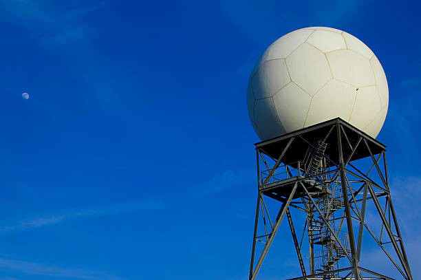 Doppler weather radar and moon Doppler radar tower with moon that was already in the sky at the time.  Plenty of room for copy. radar stock pictures, royalty-free photos & images