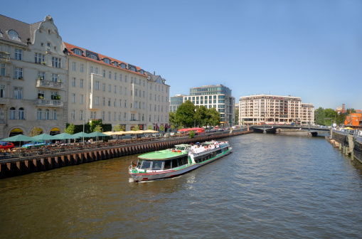 Tourist boat in the river Spree in Berlin