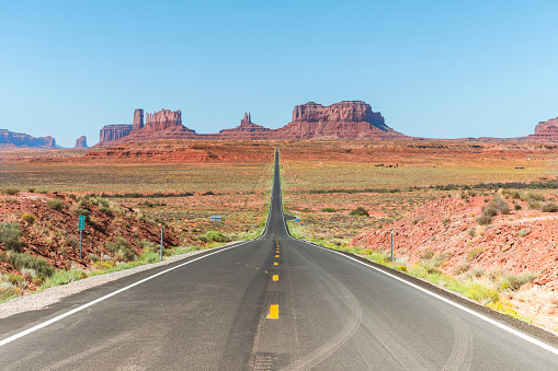 views of monument valley national park with famous buttes formations at background