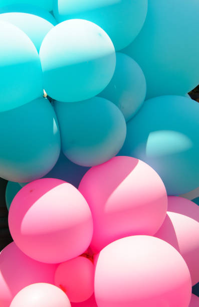 istock Pink and Blue Balloons 1404744105