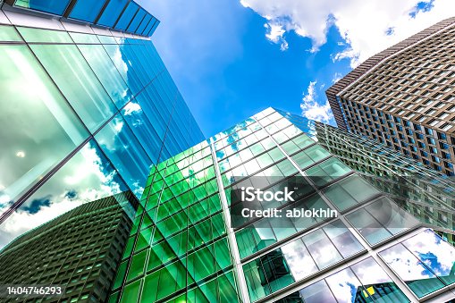istock London, UK looking up on blue sky cityscape skyline exterior of office financial bank buildings in center of city in Victoria Westminster with modern glass architecture nobody low angle view 1404746293
